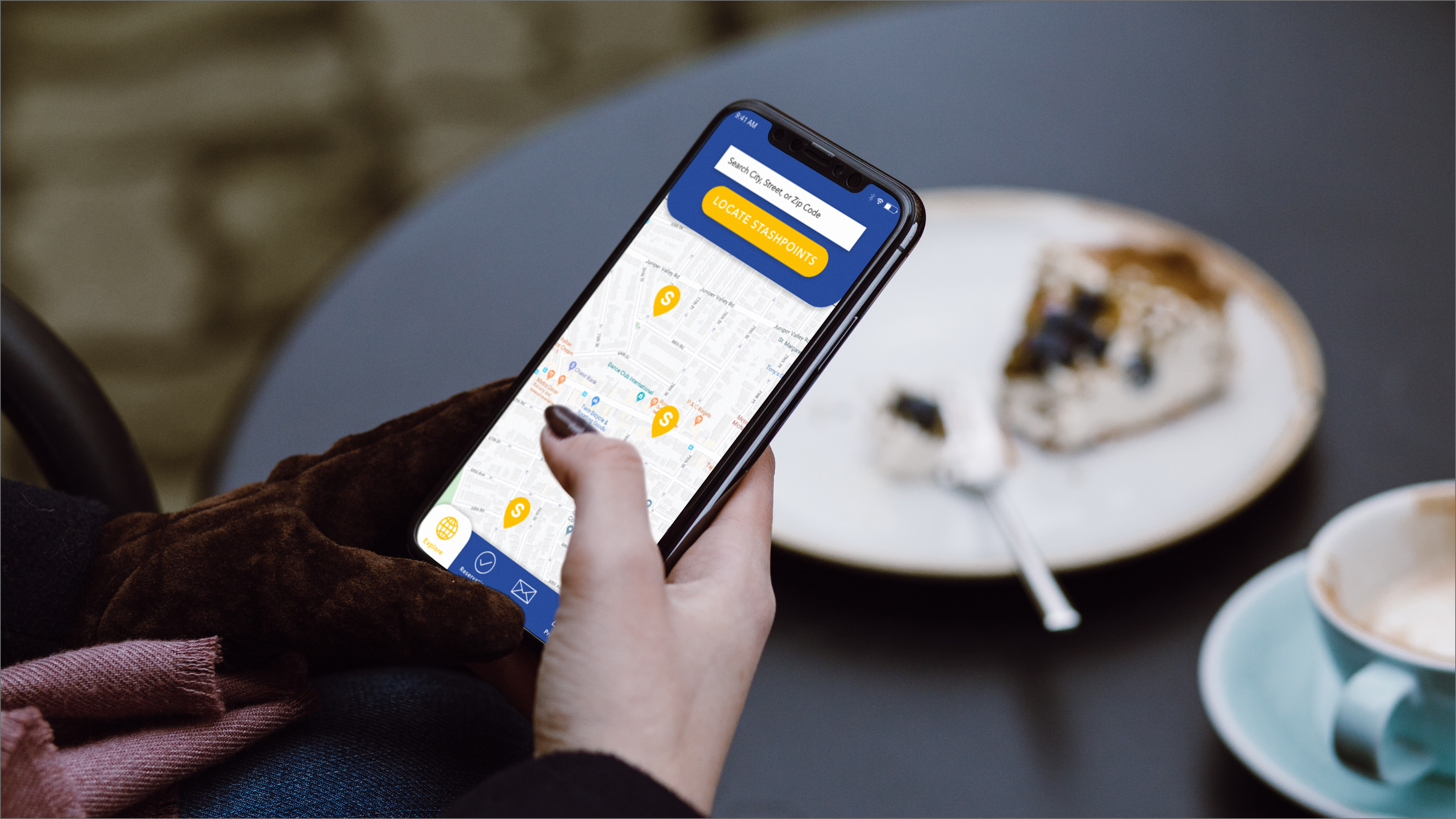 Woman-At-Cafe-iPhone-X-Mockup@2x